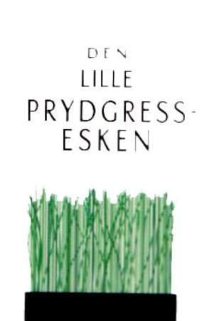 Den lille prydgress-esken. Inneholder: 1 bok. 1 saks. Fat. Gressfrø. Jord